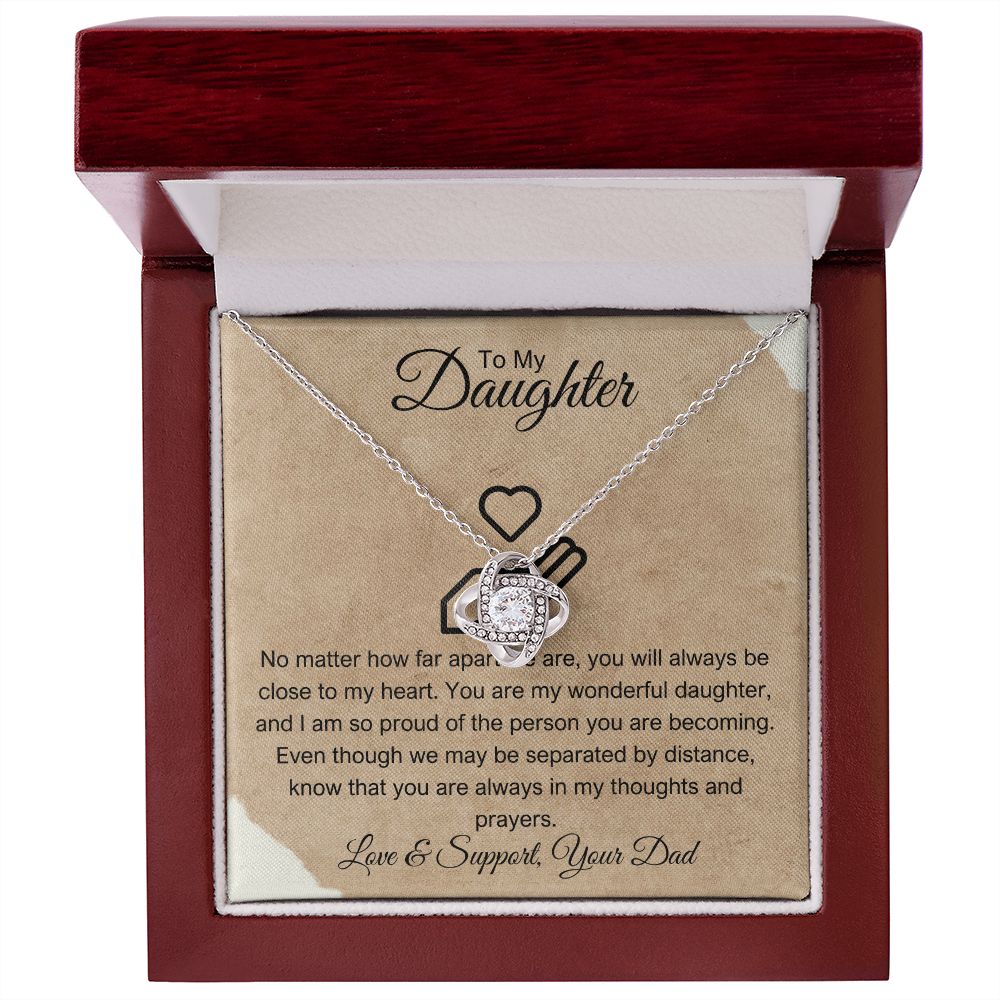 Dad gifting Love Knot Necklace to daughter